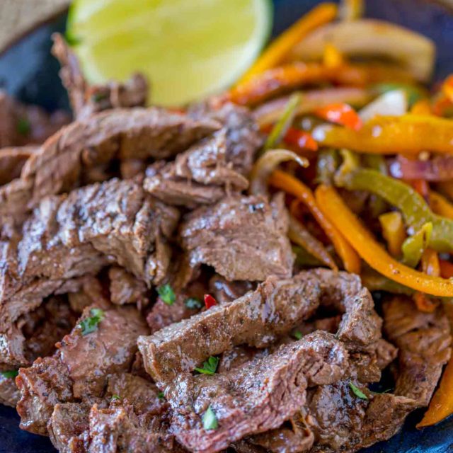 Carne Asada on plate with peppers