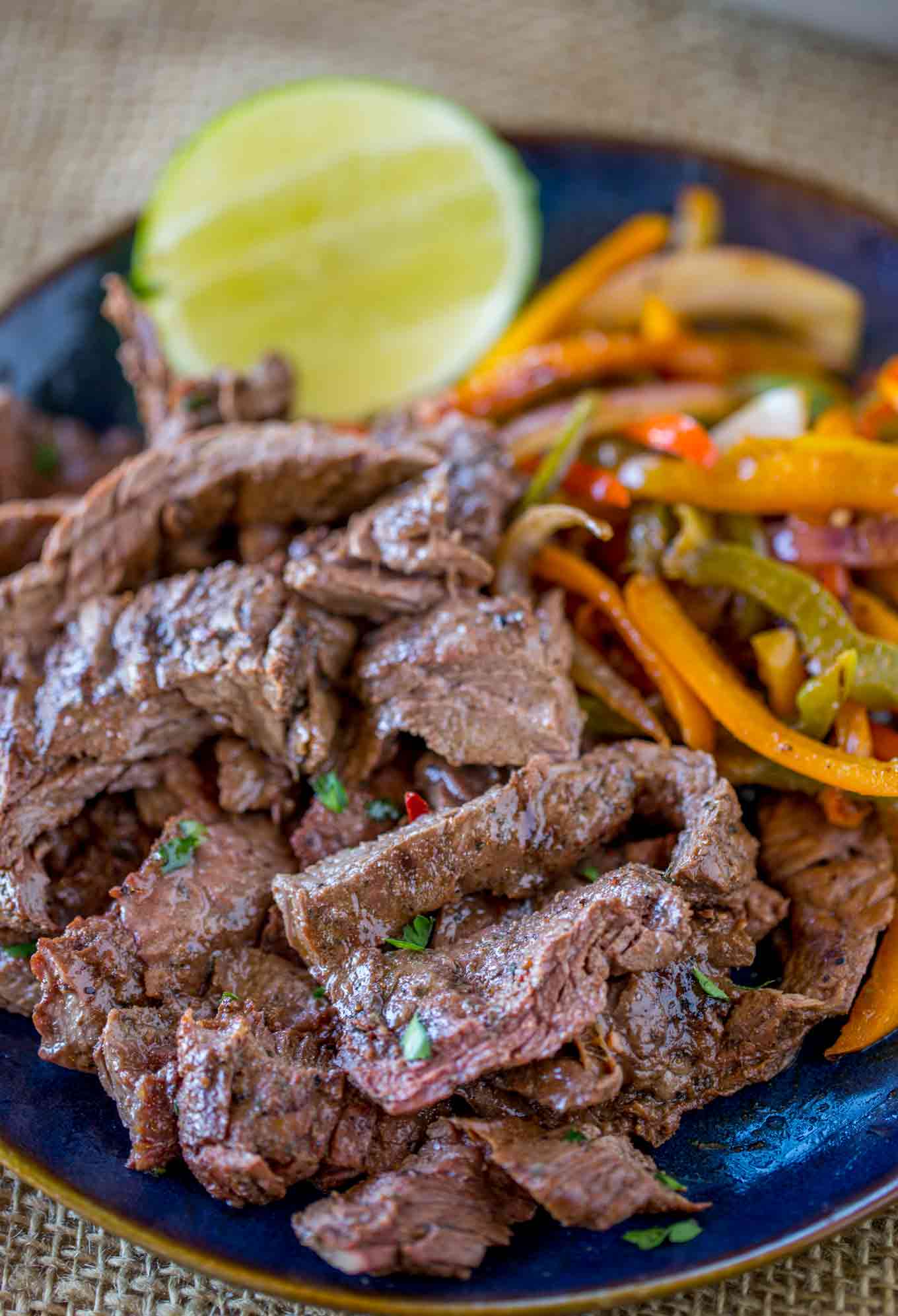 Carne Asada on plate with peppers