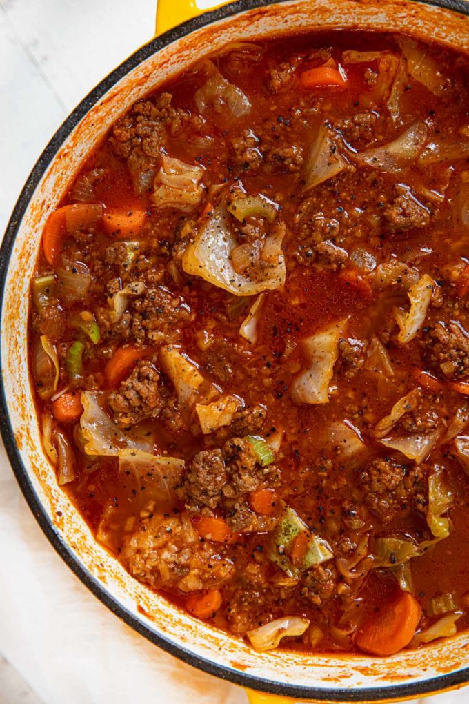 Yellow Dutch Oven with Beef and Cabbage Soup