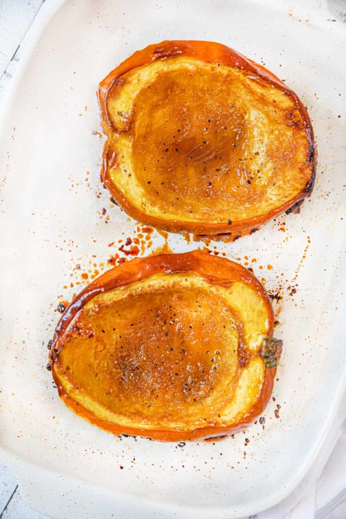 Brown Sugar Acorn Squash two halves on baking dish