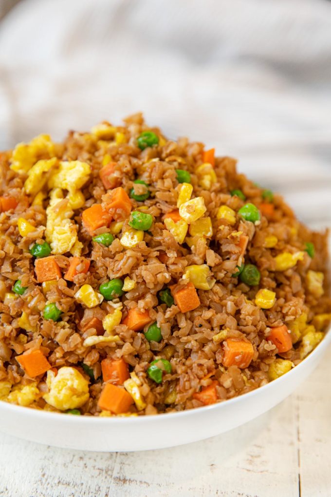 Cauliflower Egg Fried Rice in white bowl