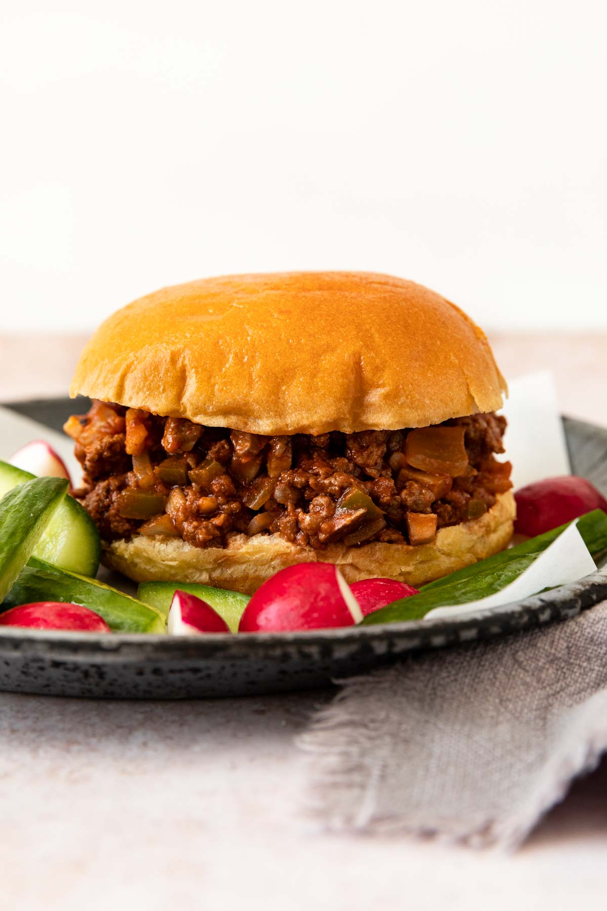 Healthy Sloppy Joes on a plate with vegetables