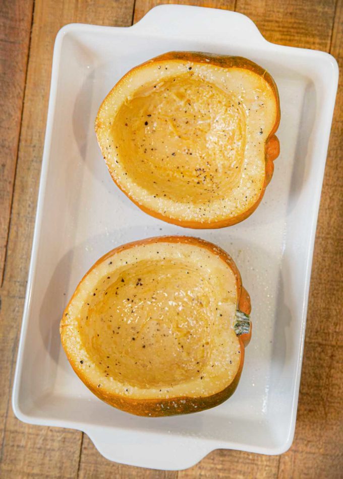 Roasted Acorn Squash in baking dish before roasting