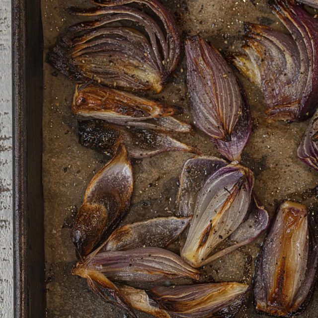 Roasted Red Onions on sheet pan