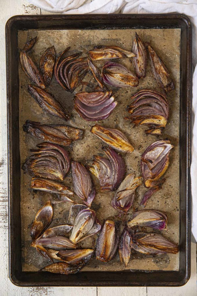 Roasted Red Onions on sheet pan