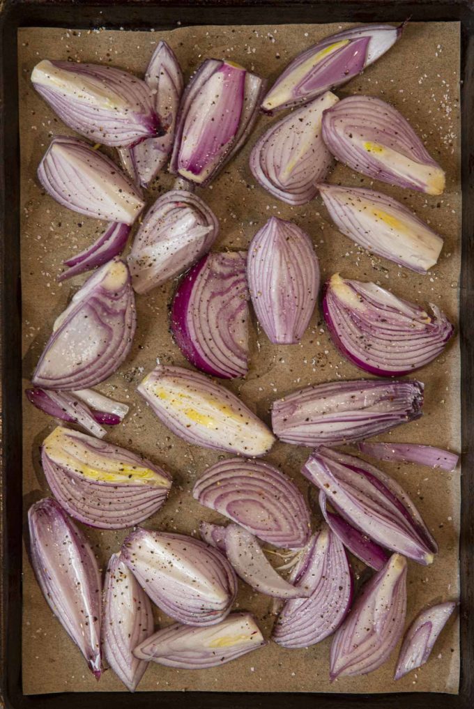 Roasted Red Onions on sheet pan before roasting