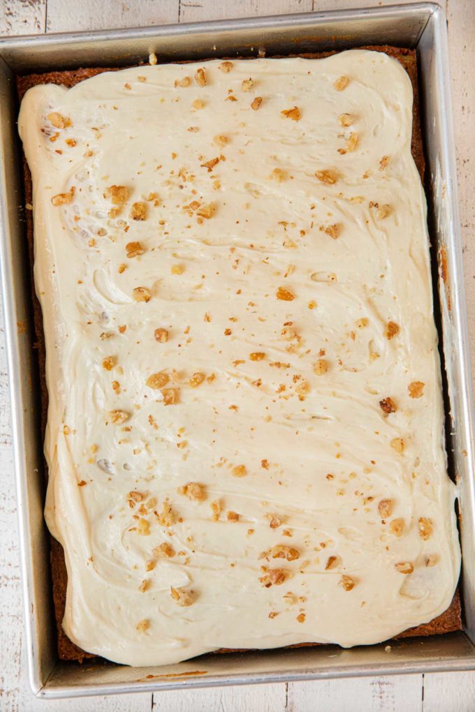 Whole Wheat Carrot Sheet Cake frosted in cake pan