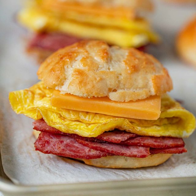 Healthy Bacon and Egg Cheese Biscuit Sandwiches on baking sheet