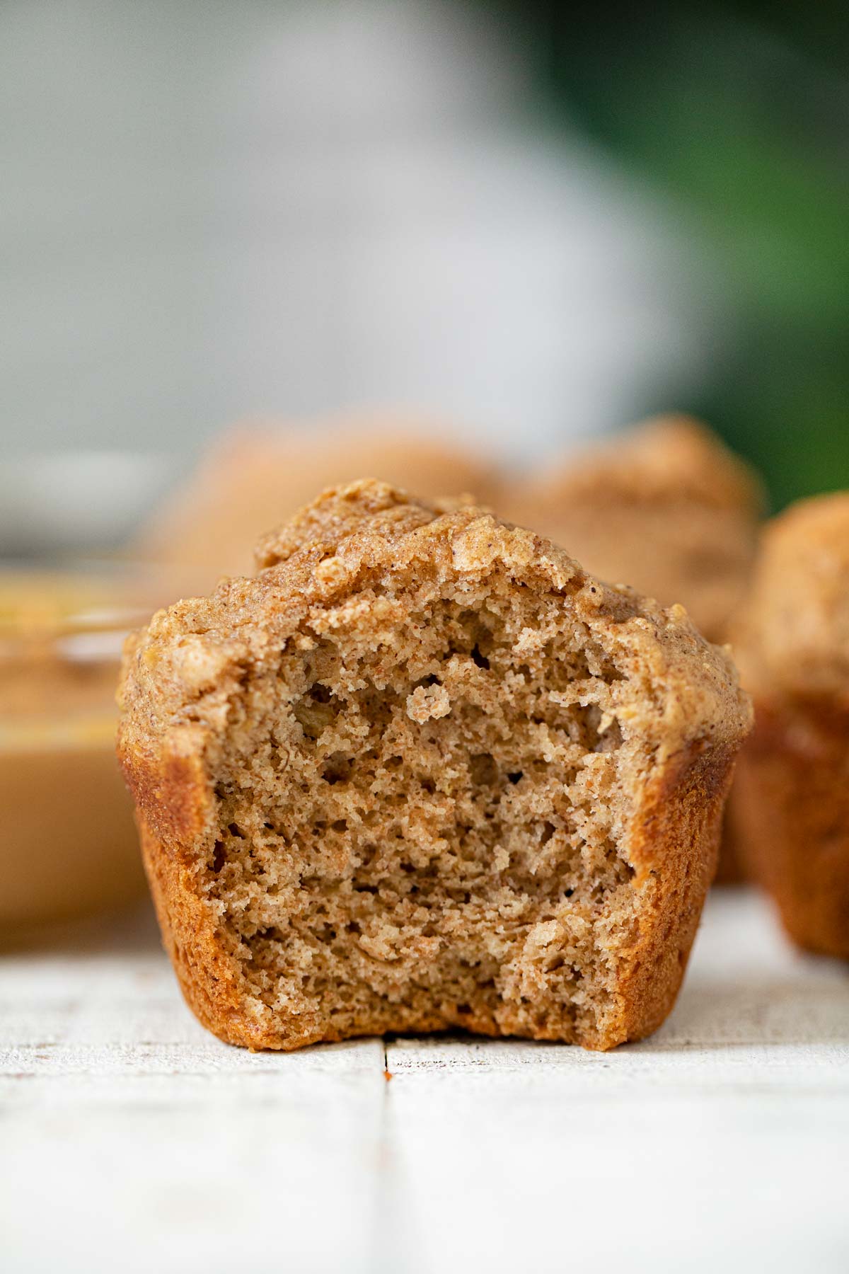 Bite taken out of Whole Wheat Peanut Butter Banana Muffin