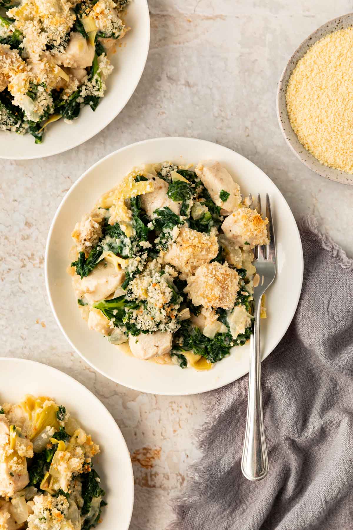 Kale Artichoke Parmesan Chicken Casserole on a plate