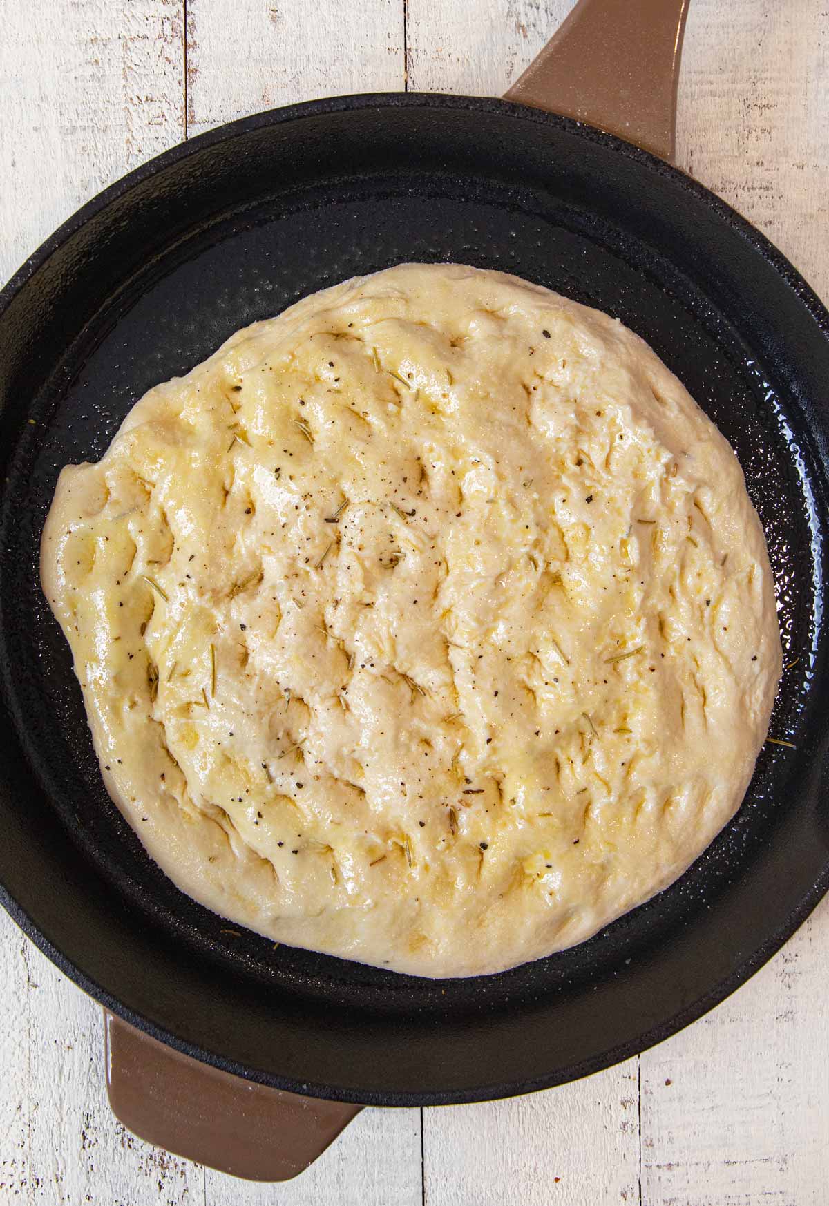 Rosemarry Foccacia Bread in cast iron skillet before cooking