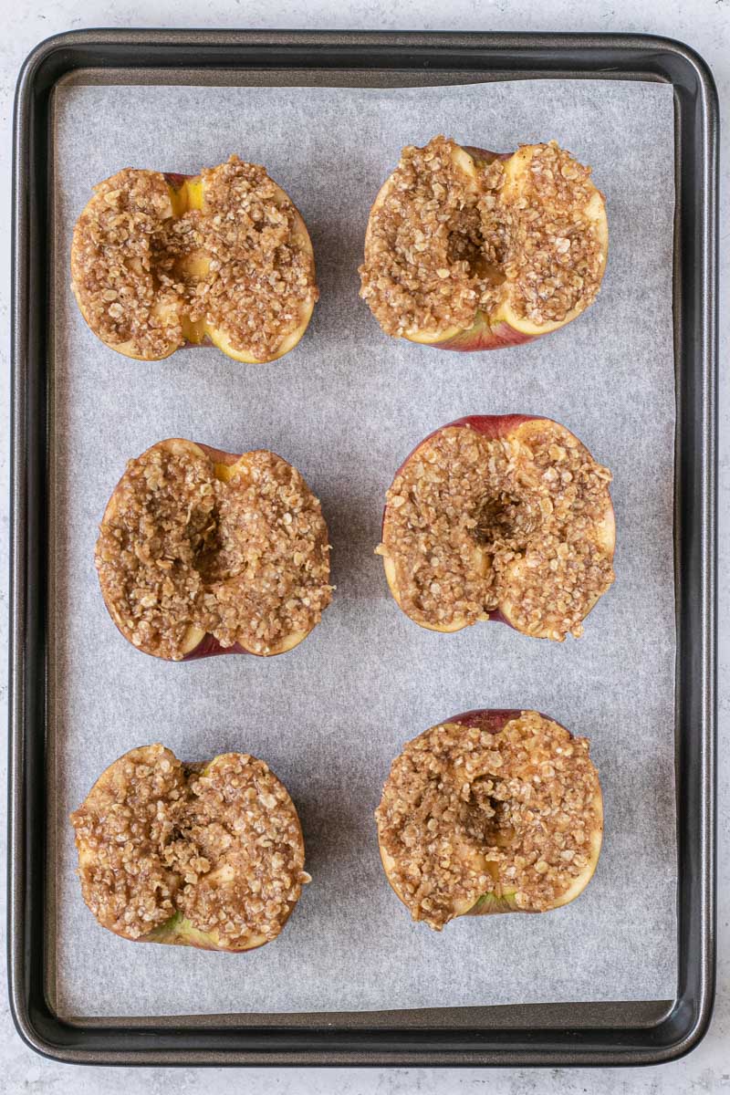 Cinnamon Streusel Baked Apples on a baking sheet