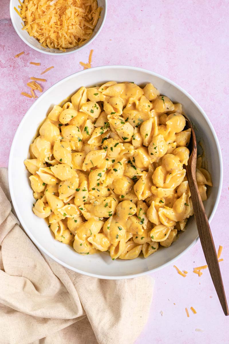 Healthy Butternut Squash Macaroni and Cheese in mixing bowl