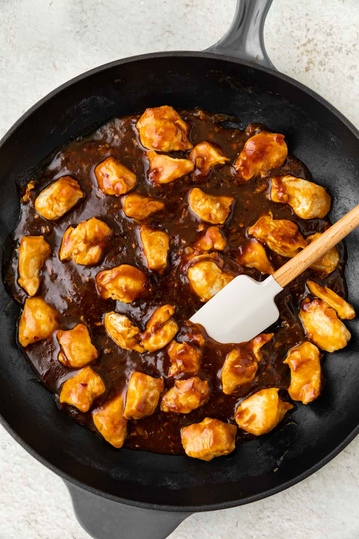 Sesame Chicken Broccoli Rice in pan cooking