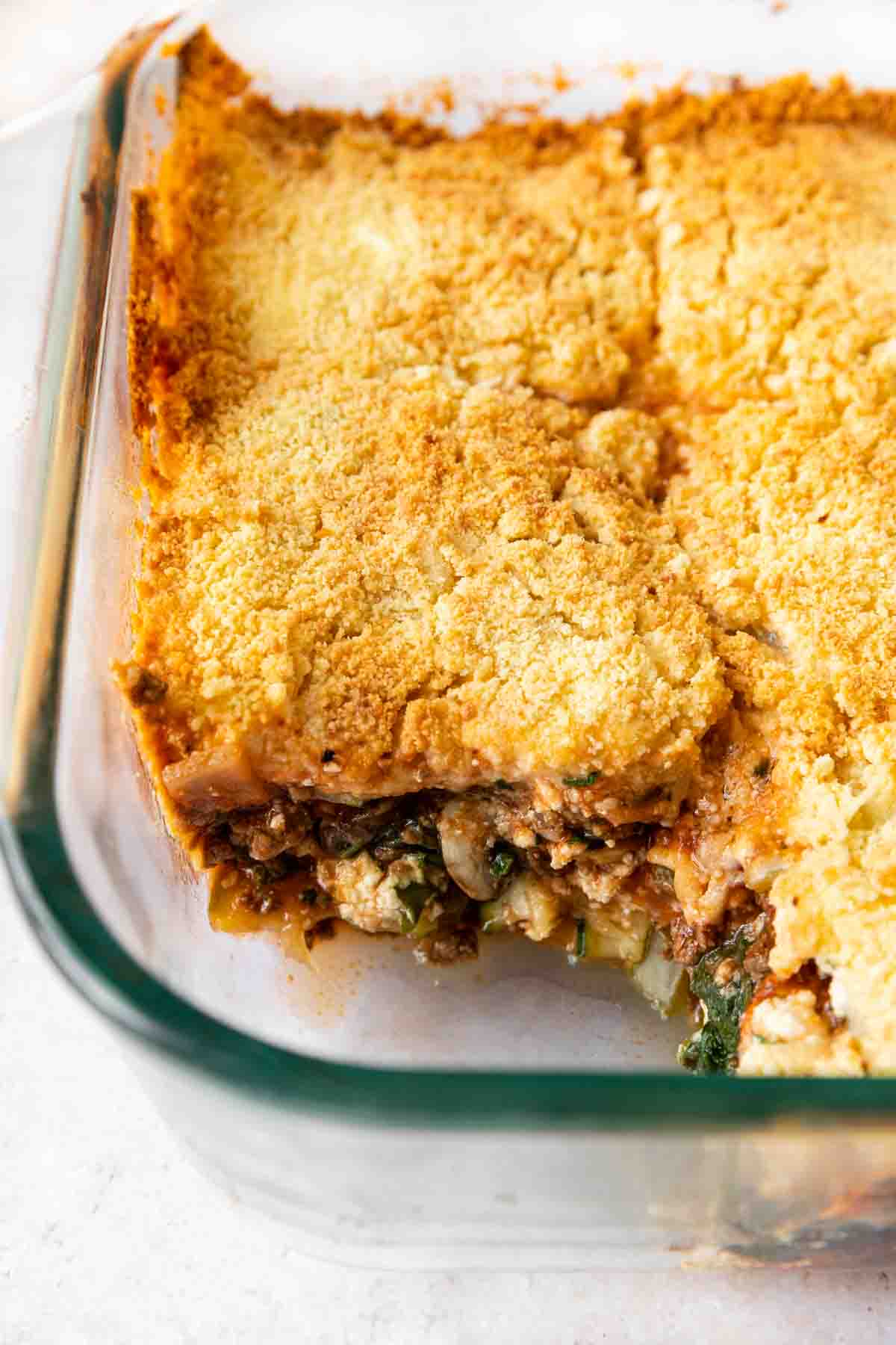 Zucchini Lasagna in baking dish with serving removed