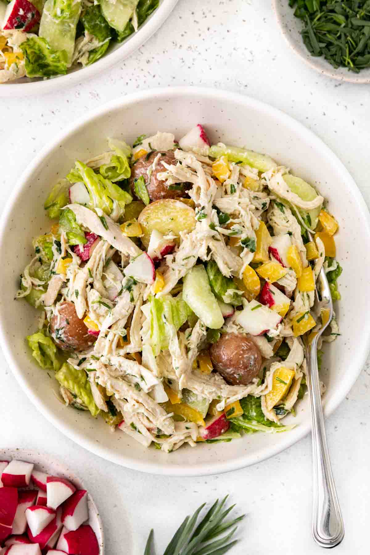 Spring Tarragon Chicken Salad  in a bowl with fork