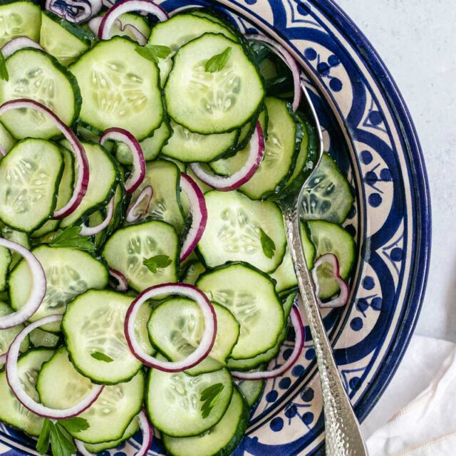 Cucumber Salad on plate with fork