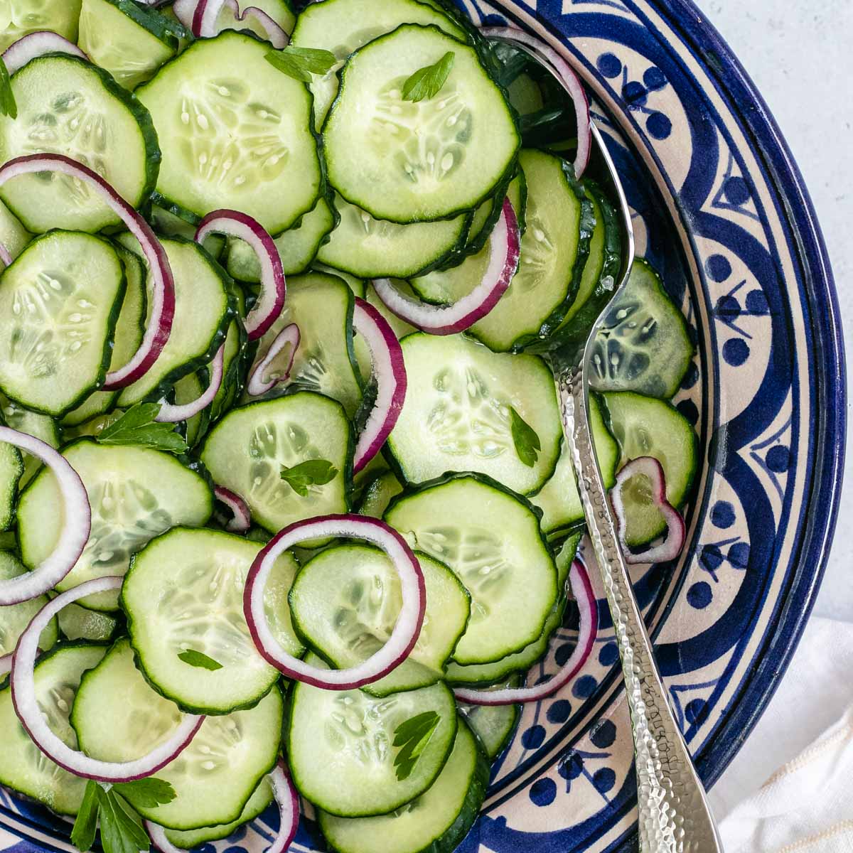 Cucumber Salad on plate with fork
