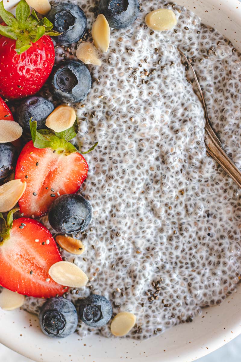 Close up of Vanilla Chai Pudding with berries on top