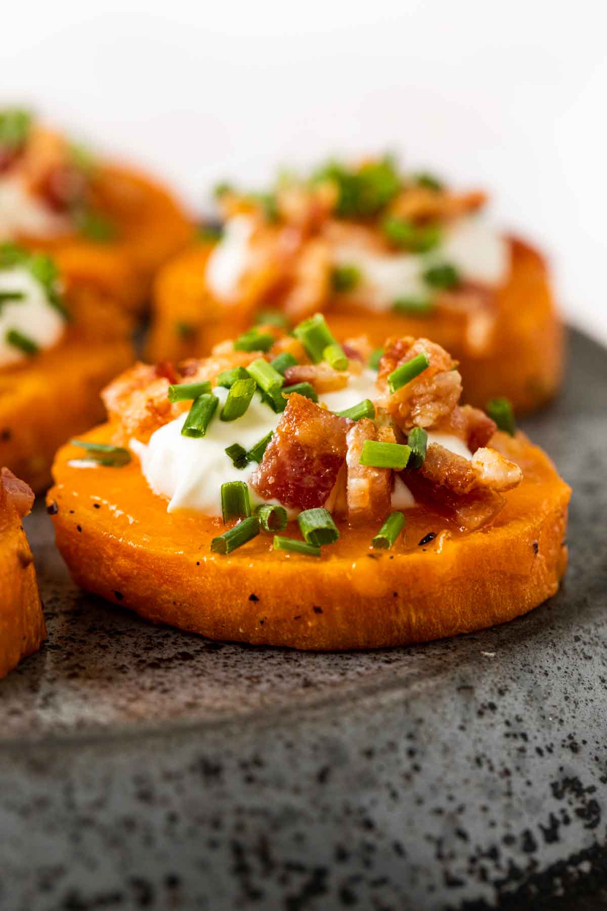 Loaded Sweet Potato Rounds on plate