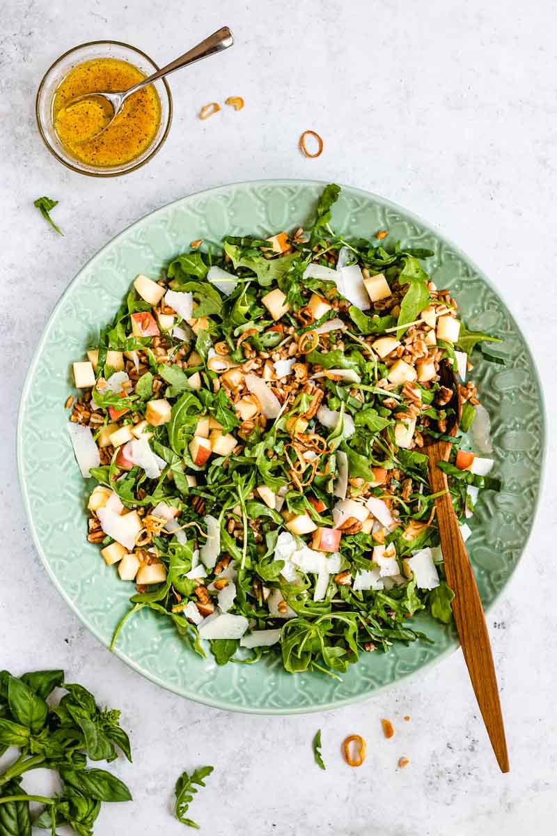 Farro Salad tossed in mixing bowl