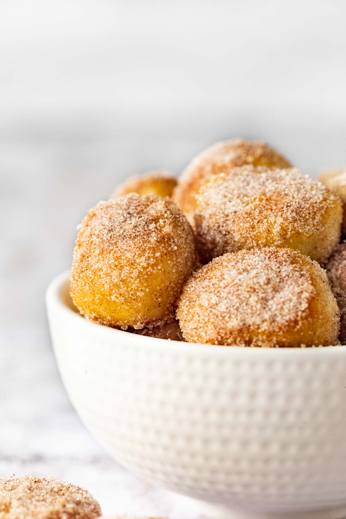 Cinnamon Sugar Pretzel Bites in white bowl