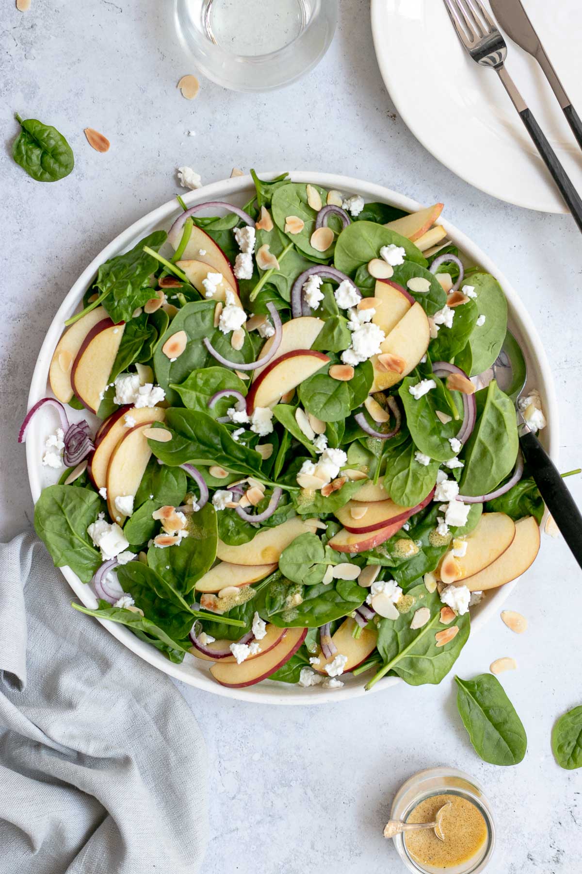 Spinach Salad with Red Wine Vinaigrette in bowl