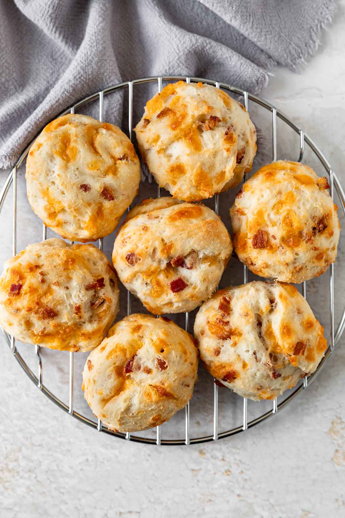 Yogurt Cheddar Bacon Biscuits on cooling rack