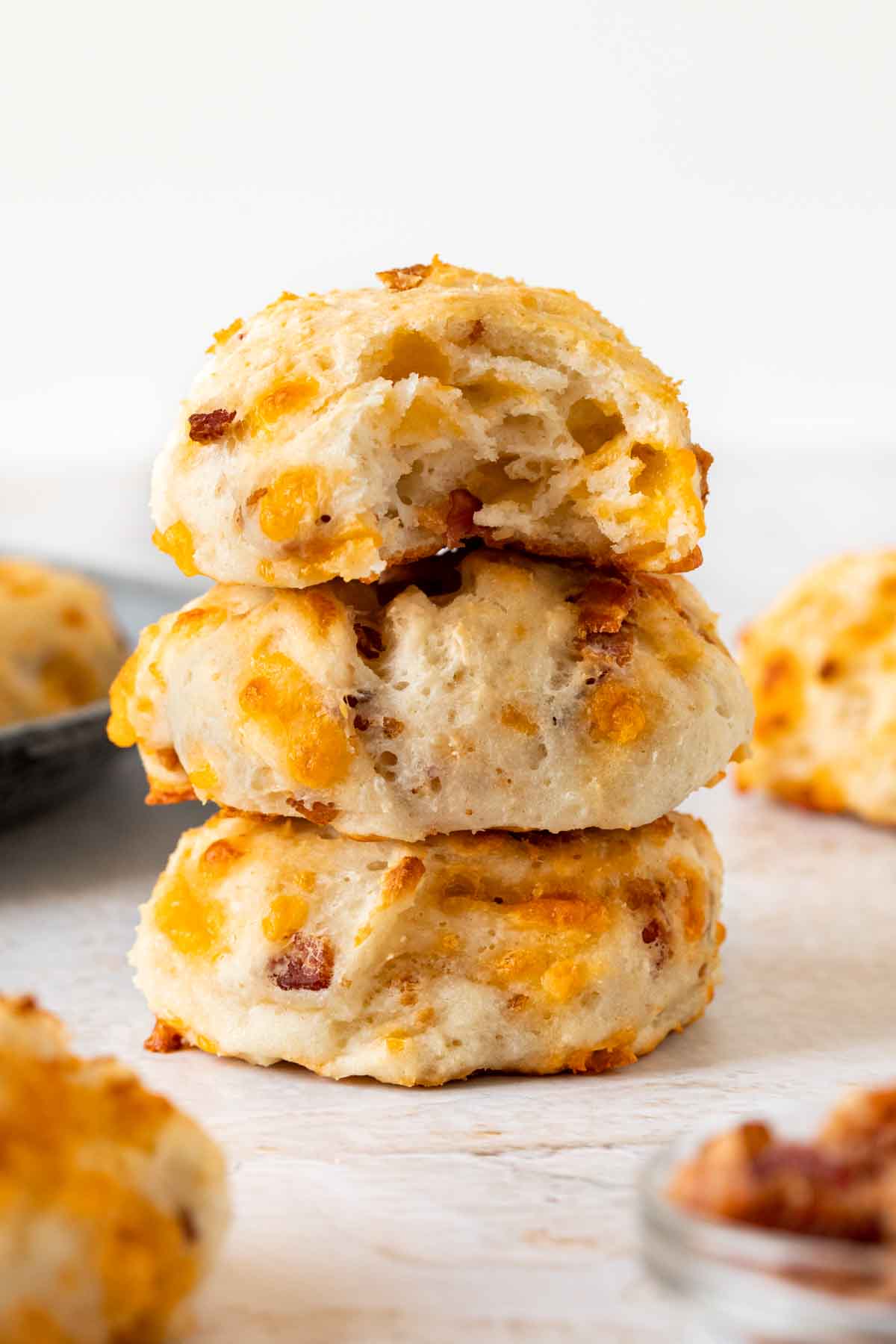 Yogurt Cheddar Bacon Biscuits stacked 